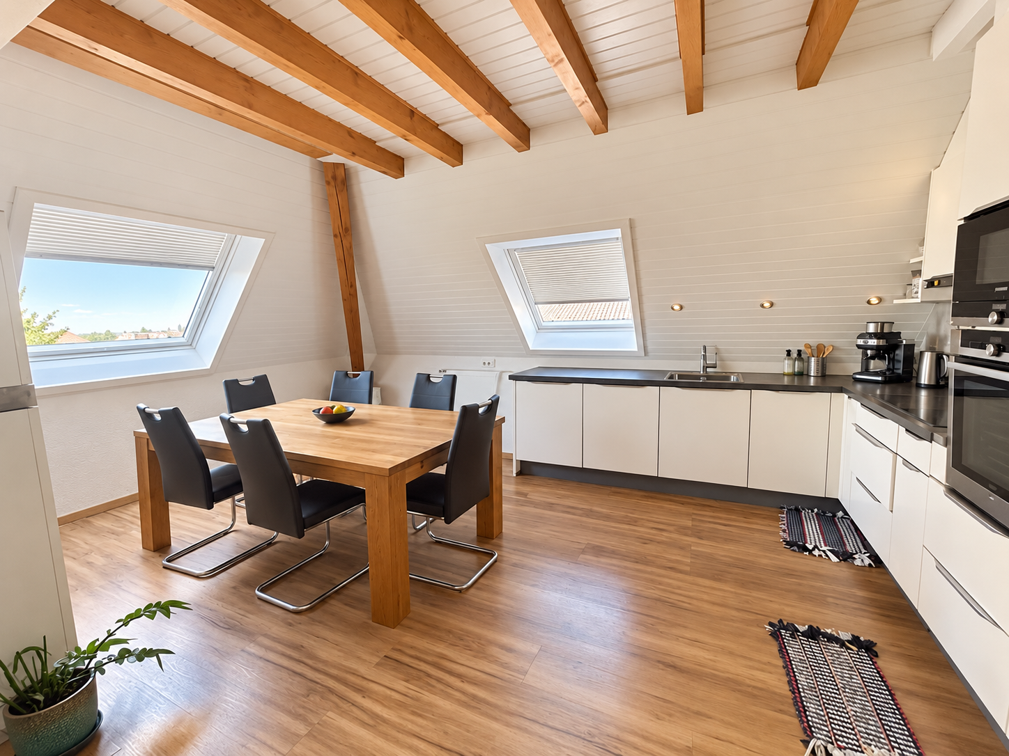 Same kitchen after real estate photo editing: natural light and balanced colours